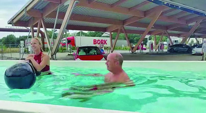 Jump in the pool while you charge up, Tesla says | Automotive News