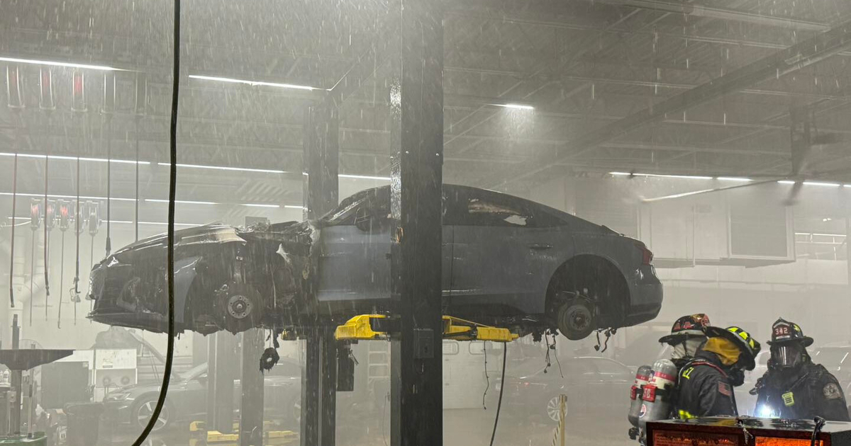 Audi EV fire inside Indiana dealership put out by firefighters ...