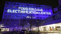A projection on the facade Ford's European headquarters following the company's announcement to build future electric cars in Cologne, Germany.
