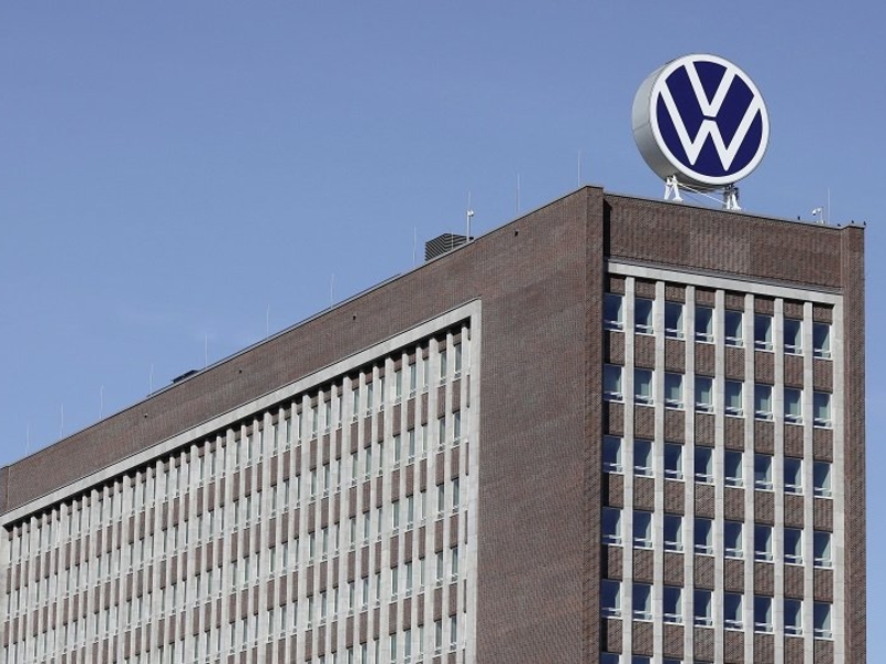 VW trims growth estimates as industry slowdown bites